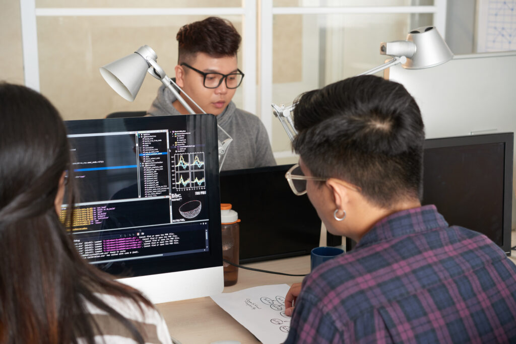 Why Every Business Needs Custom Software Solutions in 2025 joint work of talented programmers